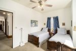 Here, Soothing Blues and Charming Decor Set the Scene for a Peaceful Night`s Sleep